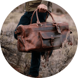 Kodiak Leather bag carried by a person