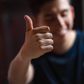 man giving a thumbs up