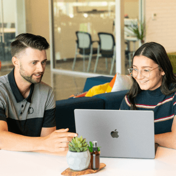 Disruptive employees looking at a laptop screen